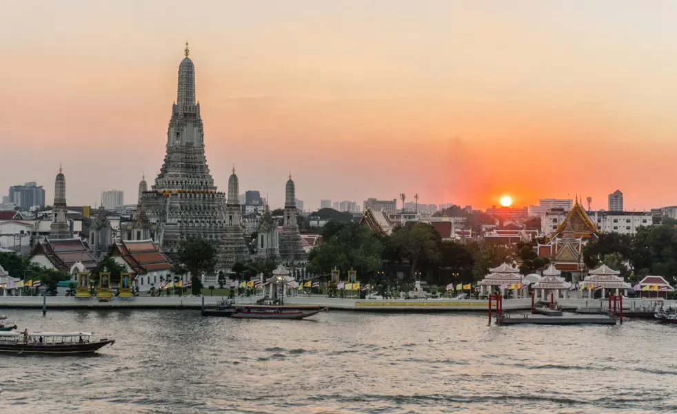 view of Wat Arun during sunset in Bangkok, Thailand