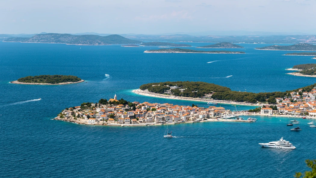 Small island in Croatia surrounded by blue water