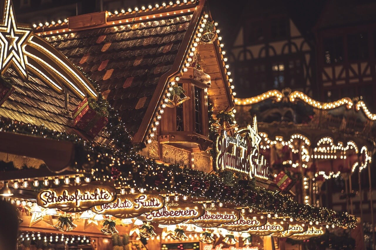 Christmas market booth selling chocolate fruits in Germany