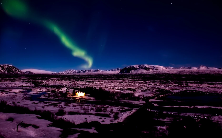 Northern Lights in the distance in Iceland