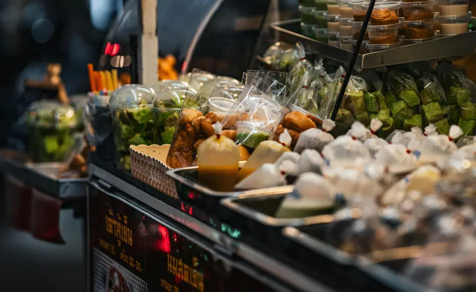 close of up street food sold at a stall in Thailand