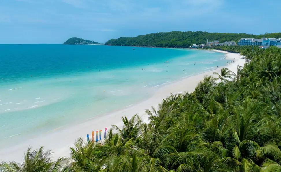 Aerial view of a white sandy beach with blue water in Phu Quoc, Vietnam